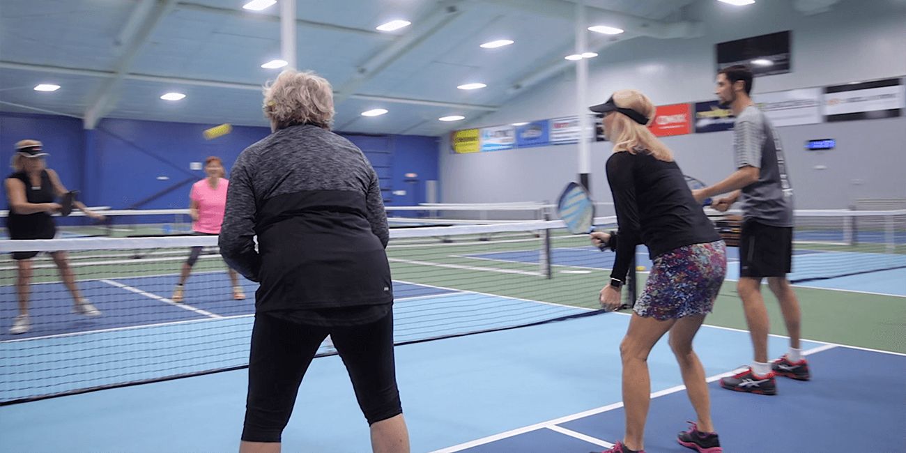 People playing pickleball